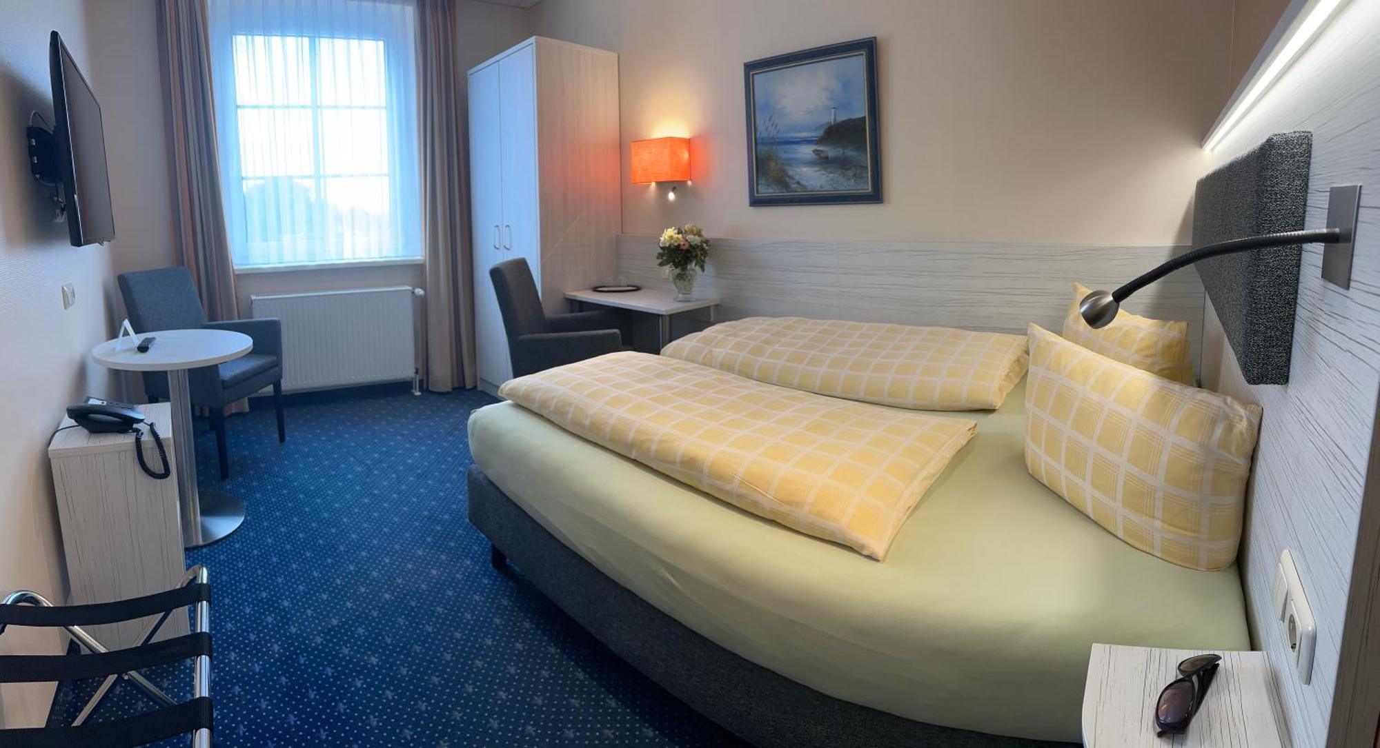 Duenenhotel Am Meer รอสต็อค ภายนอก รูปภาพ